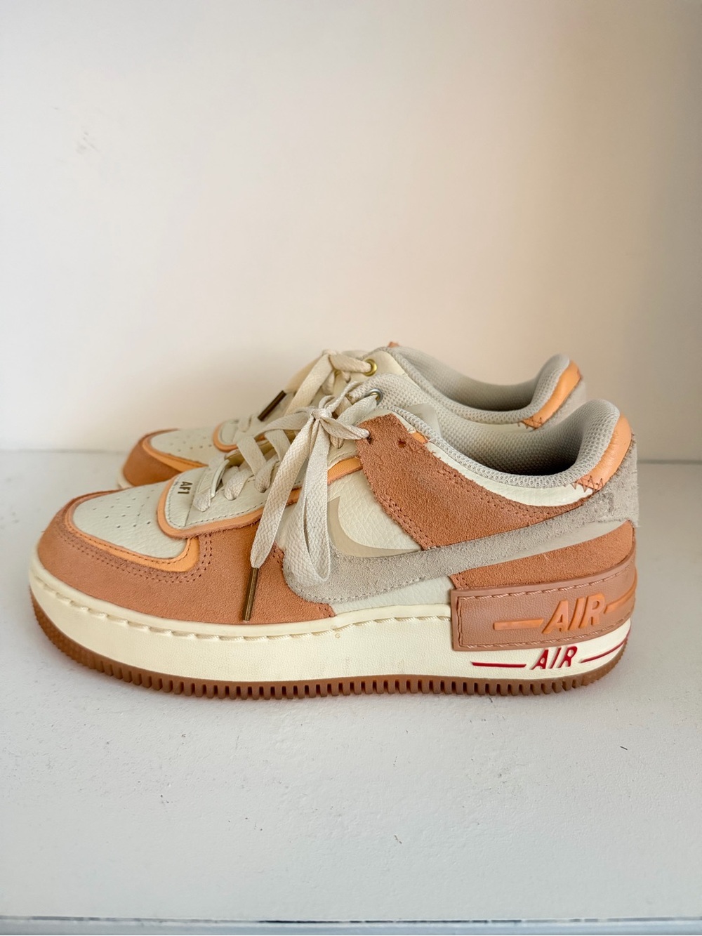 Women’s Peach & Cream Air Force 1  Sneakers